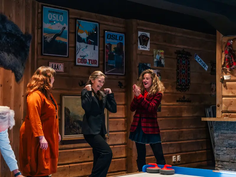 Friends playing street curling