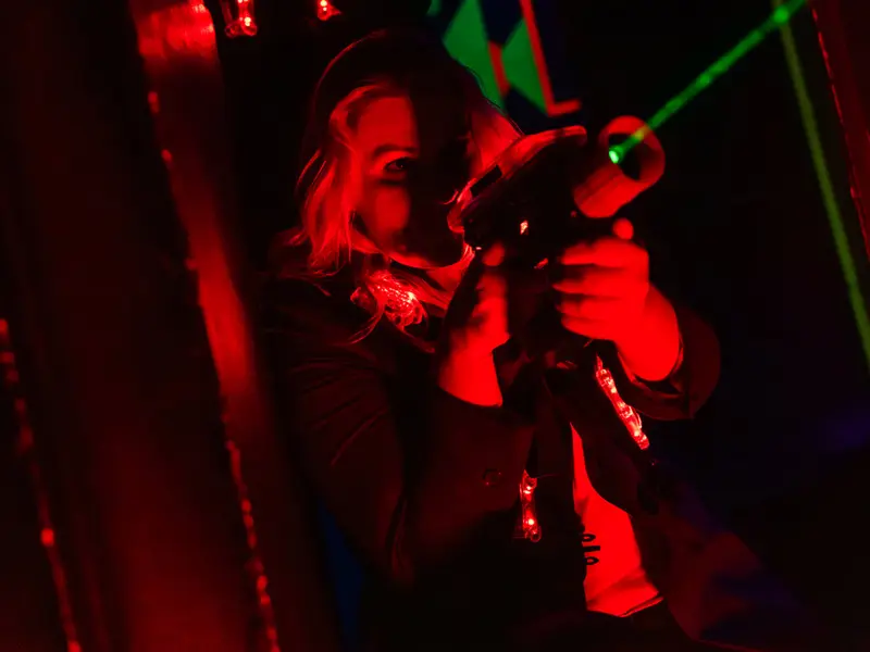 Laser tag in the arena with green lasers