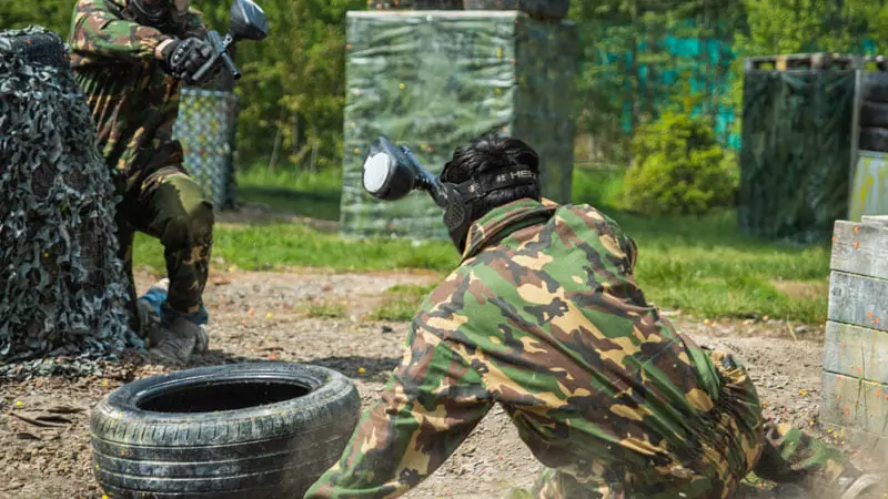 Full speed on an outdoor paintball field